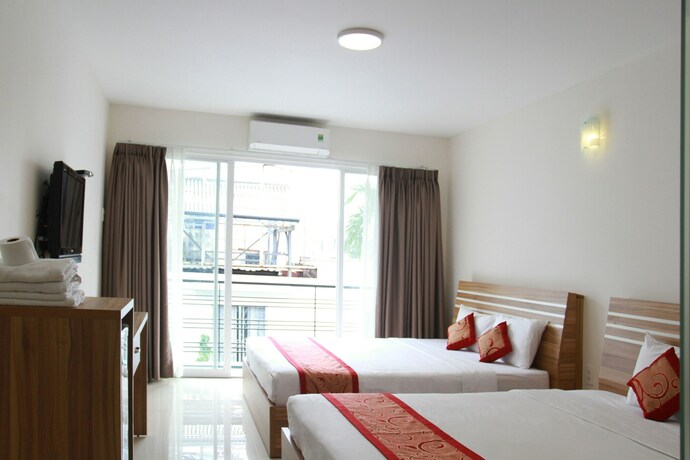 Imagen de la habitación del Hotel Ngoc Minh. Foto 23