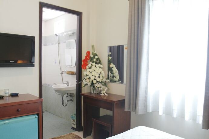 Imagen de la habitación del Hotel Ngoc Minh. Foto 24