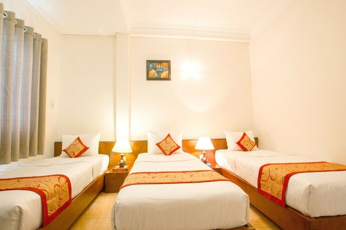 Imagen de la habitación del Hotel Ngoc Minh. Foto 25