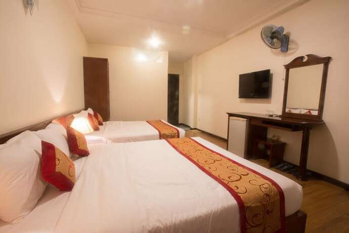 Imagen de la habitación del Hotel Ngoc Minh. Foto 26
