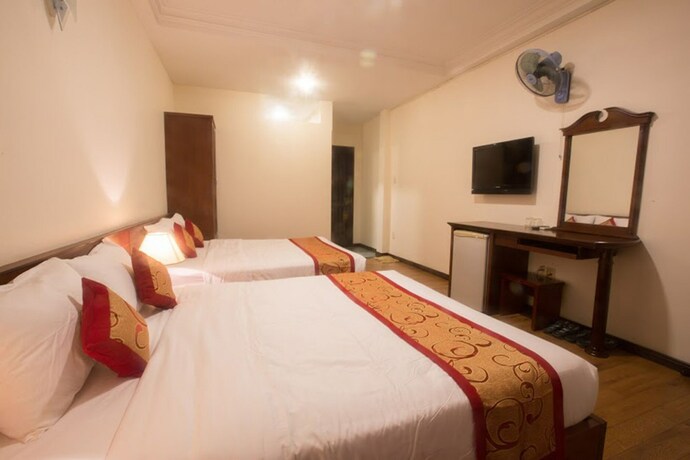 Imagen de la habitación del Hotel Ngoc Minh. Foto 33
