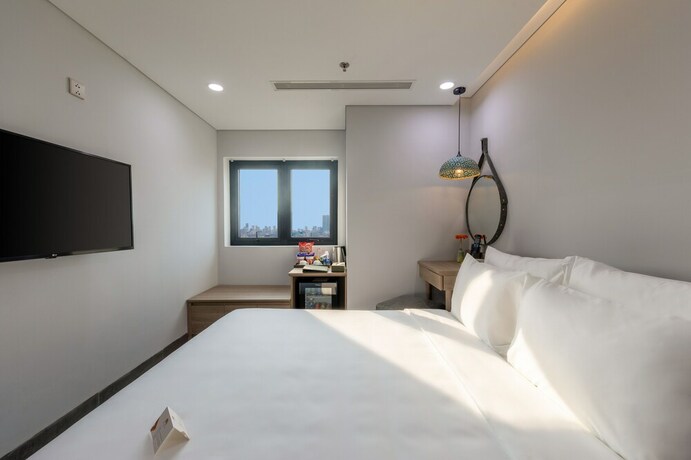 Imagen de la habitación del Hotel Nguyen Gia. Foto 22