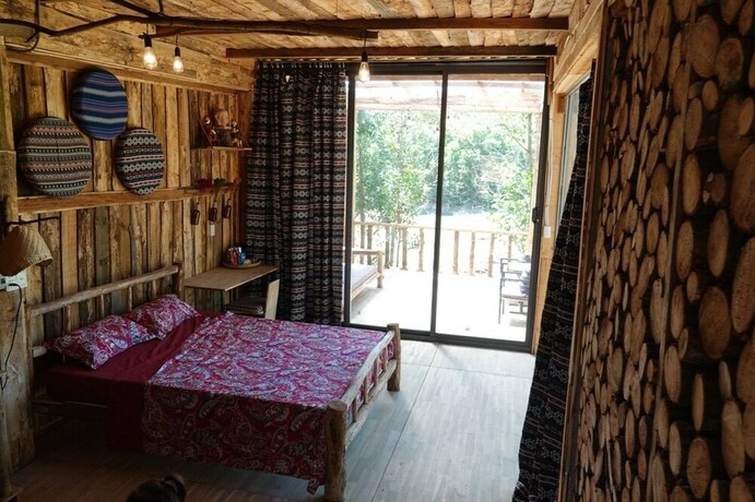 Imagen de la habitación del Hotel Nguyen Shack Phong Nha Eco Resort. Foto 3