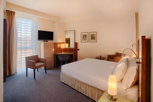 Imagen de la habitación del Hotel Nh Bergamo. Foto 18