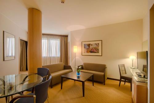 Imagen de la habitación del Hotel Nh Bologna Villanova. Foto 20