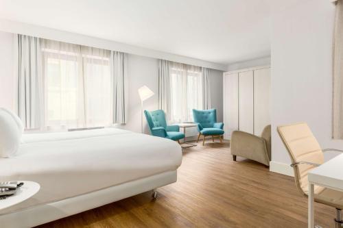 Imagen de la habitación del Hotel Nh Brussels Grand Place Arenberg. Foto 14