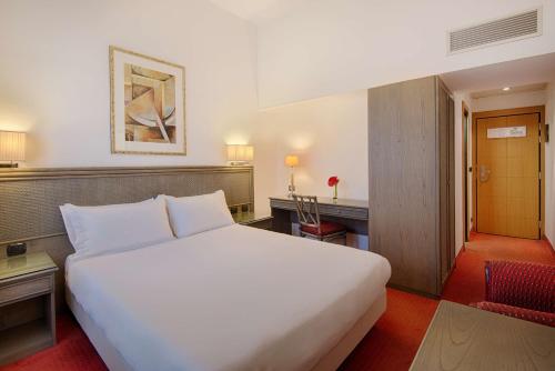 Imagen de la habitación del Hotel Nh Catania Centro. Foto 17