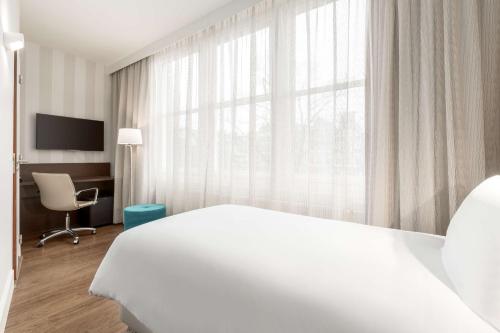 Imagen de la habitación del Hotel Nh City Centre Amsterdam. Foto 8