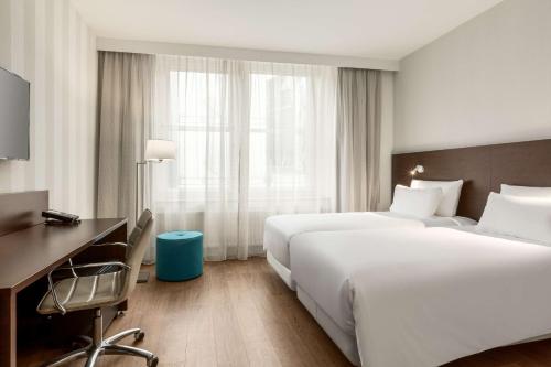 Imagen de la habitación del Hotel Nh City Centre Amsterdam. Foto 10