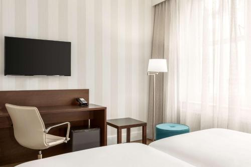 Imagen de la habitación del Hotel Nh City Centre Amsterdam. Foto 20