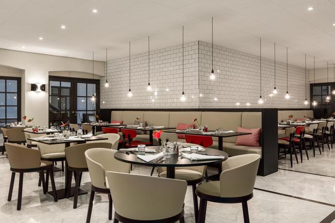 Imagen del bar/restaurante del Hotel Nh Collection Amsterdam Barbizon Palace. Foto 4