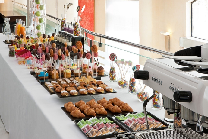 Imagen del bar/restaurante del Hotel Nh Collection Barcelona Pódium. Foto 10