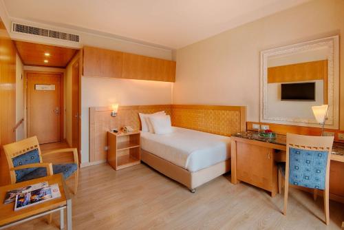 Imagen de la habitación del Hotel Nh Collection Genova Marina. Foto 9