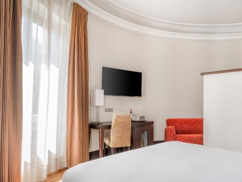 Imagen de la habitación del Hotel Nh Collection Granada Victoria. Foto 8