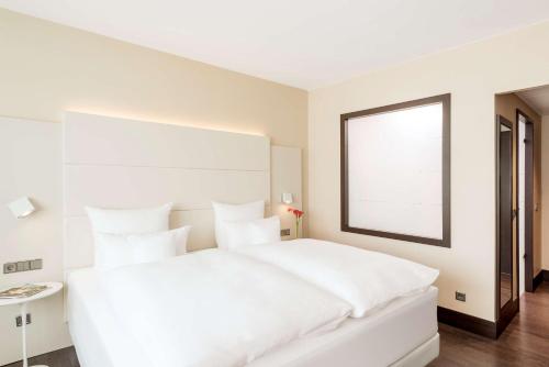 Imagen de la habitación del Hotel Nh Collection Nürnberg City. Foto 14