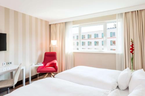 Imagen de la habitación del Hotel Nh Collection Nürnberg City. Foto 15