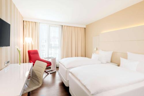 Imagen de la habitación del Hotel Nh Collection Nürnberg City. Foto 16