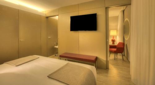 Imagen de la habitación del Hotel Nh Collection Porto Batalha. Foto 19