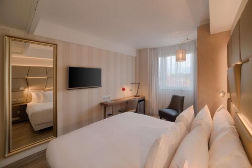 Imagen de la habitación del Hotel Nh Collection Roma Centro. Foto 8