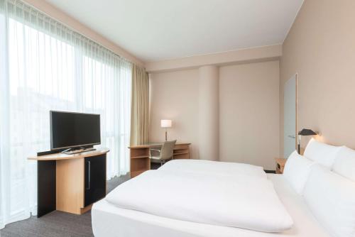 Imagen de la habitación del Hotel Nh Düsseldorf City. Foto 13