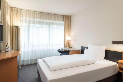 Imagen de la habitación del Hotel Nh Düsseldorf City. Foto 14