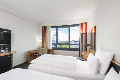 Imagen de la habitación del Hotel Nh Düsseldorf City. Foto 16