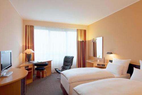 Imagen de la habitación del Hotel Nh Düsseldorf City. Foto 20