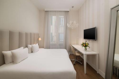 Imagen de la habitación del Hotel Nh Genova Centro. Foto 13