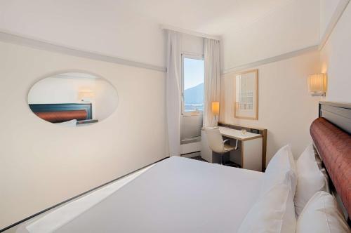 Imagen de la habitación del Hotel Nh La Spezia. Foto 19