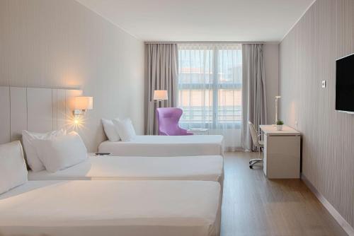 Imagen de la habitación del Hotel Nh Lecco Pontevecchio. Foto 15