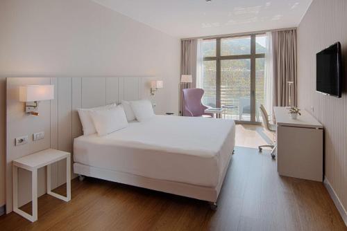 Imagen de la habitación del Hotel Nh Lecco Pontevecchio. Foto 19