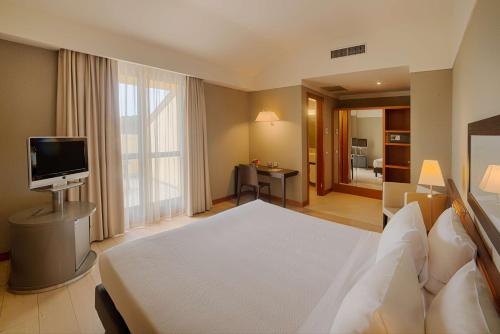 Imagen de la habitación del Hotel Nh Linate. Foto 12