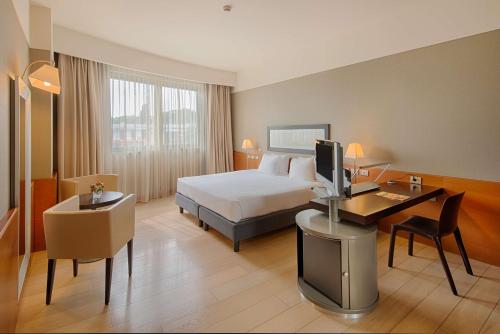 Imagen de la habitación del Hotel Nh Linate. Foto 18