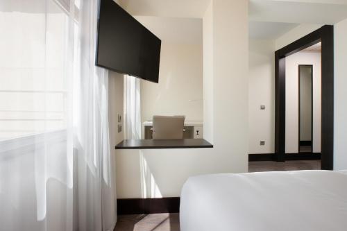 Imagen de la habitación del Hotel Nh Madrid Lagasca. Foto 8