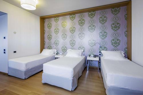 Imagen de la habitación del Hotel Nh Milano Fiera. Foto 10