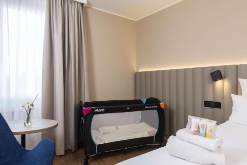 Imagen de la habitación del Hotel Nh München Airport. Foto 6