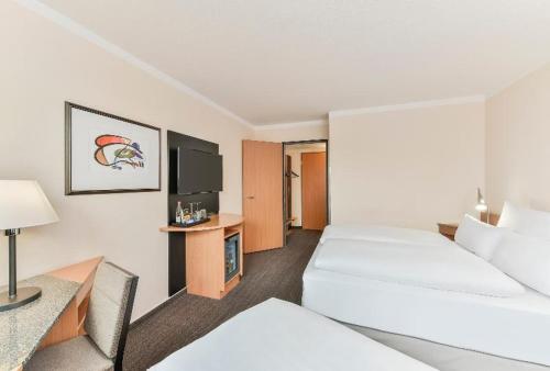 Imagen de la habitación del Hotel Nh München Airport. Foto 12