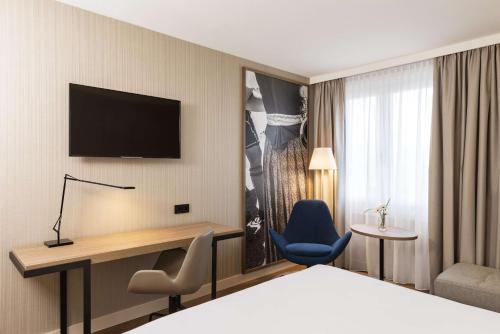 Imagen de la habitación del Hotel Nh München Airport. Foto 15