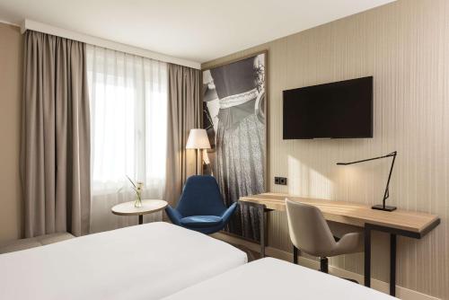 Imagen de la habitación del Hotel Nh München Airport. Foto 17