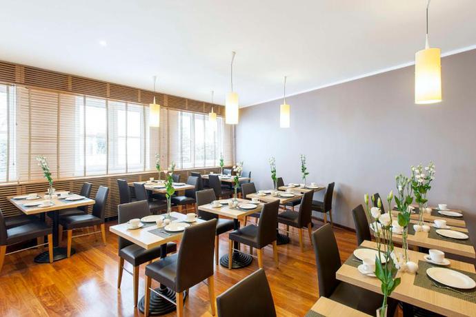 Imagen del bar/restaurante del Hotel Nh München Messe. Foto 1