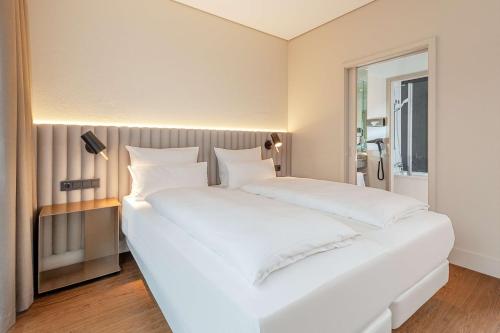 Imagen de la habitación del Hotel Nh München Unterhaching. Foto 19