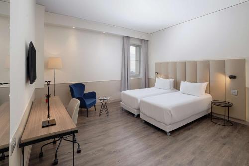 Imagen de la habitación del Hotel Nh Napoli Panorama. Foto 10