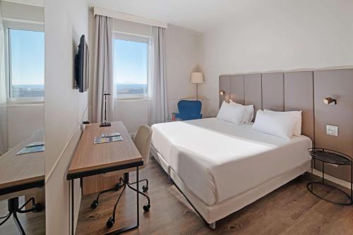 Imagen de la habitación del Hotel Nh Napoli Panorama. Foto 18