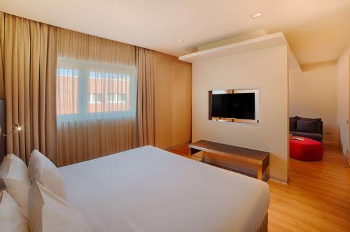 Imagen de la habitación del Hotel Nh Orio Al Serio. Foto 11