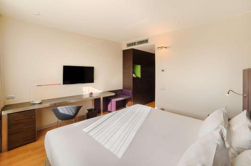 Imagen de la habitación del Hotel Nh Orio Al Serio. Foto 17