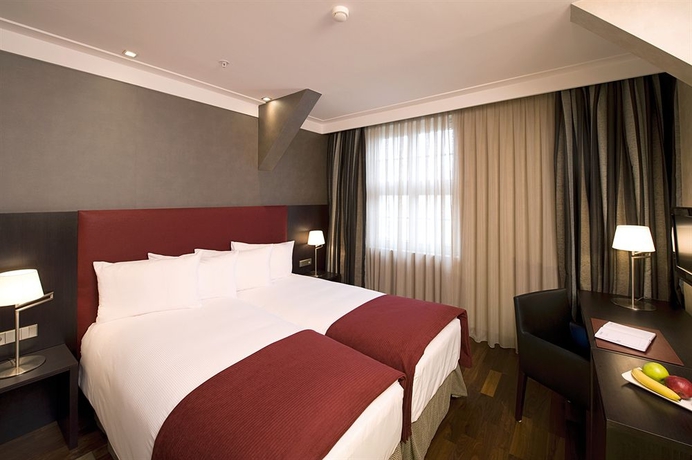 Imagen de la habitación del Hotel Nh Poznan. Foto 9