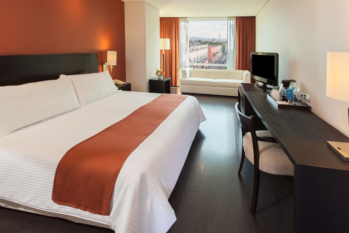 Imagen de la habitación del Hotel Nh Puebla Centro Histórico. Foto 7