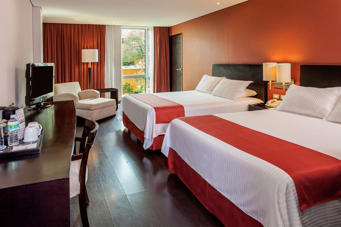 Imagen de la habitación del Hotel Nh Puebla Centro Histórico. Foto 8