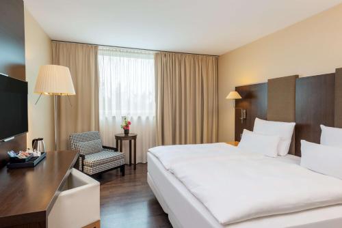 Imagen de la habitación del Hotel Nh Stuttgart Airport. Foto 9