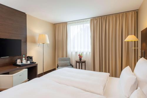 Imagen de la habitación del Hotel Nh Stuttgart Airport. Foto 10